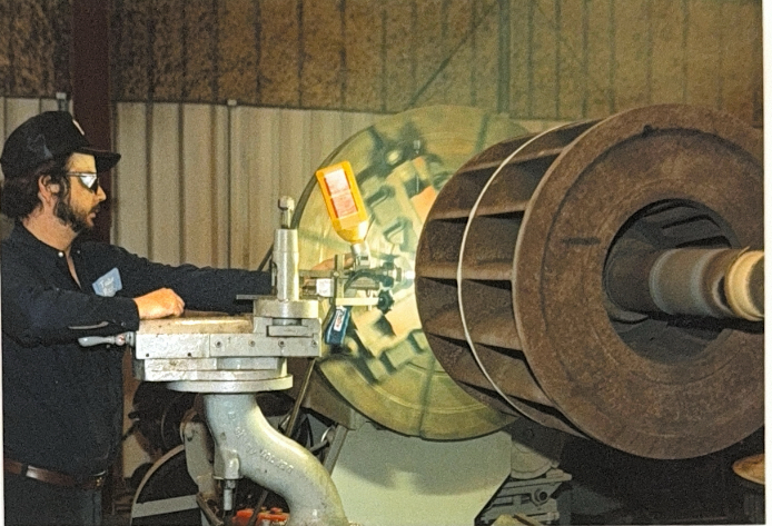 Machinist operating balancing equipment
