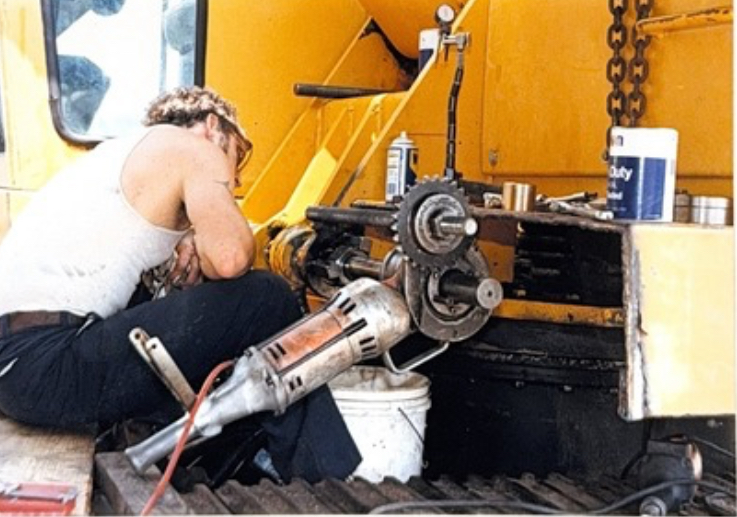 Main boom mount repair on a John Deere High Hoe. Welded and line-bored in the field during Teston's early years.