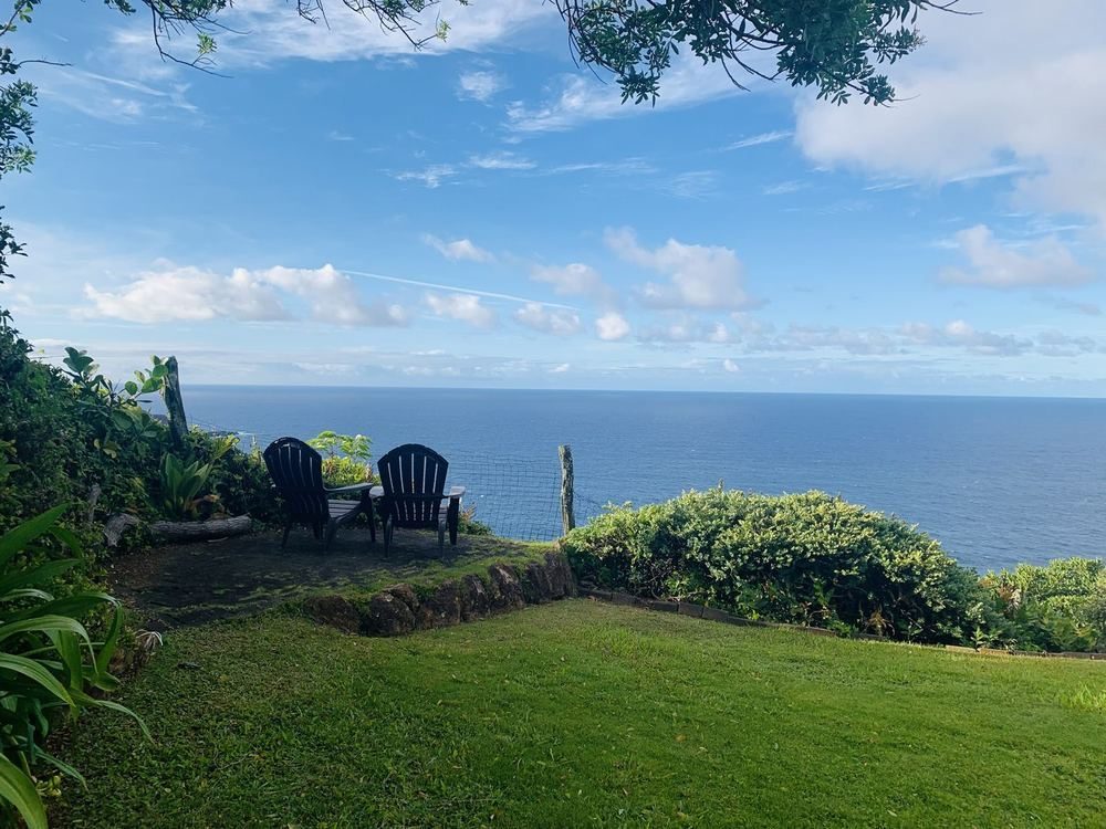 Two chairs overlooking the ocean