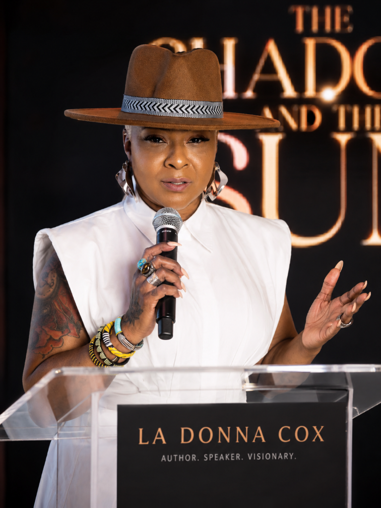 LaDonna Cox speaking on stage
