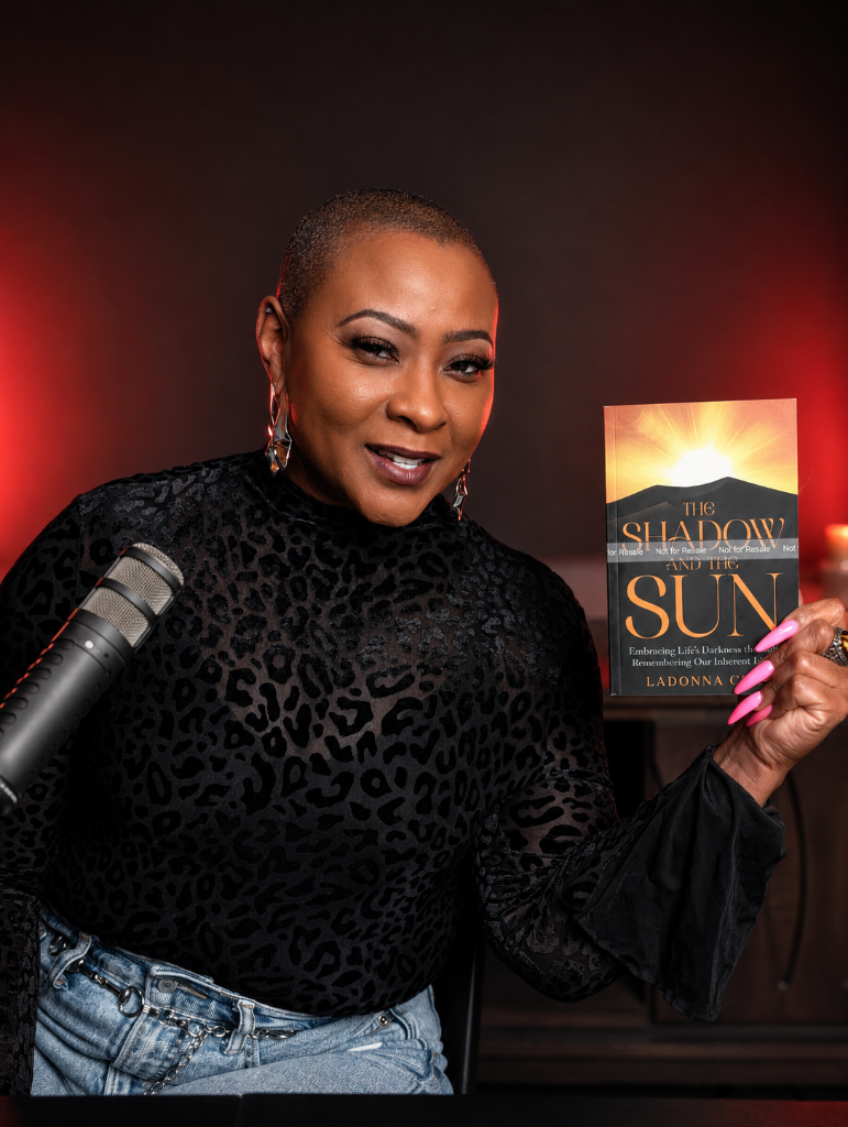 LaDonna Cox holding The Shadow and the Sun