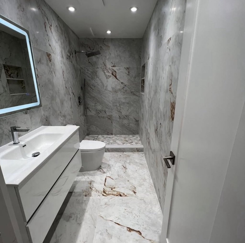Marble Bathroom — Floating Vanity & LED Mirror — Miami-Dade, FL by Carbon Haus Construction