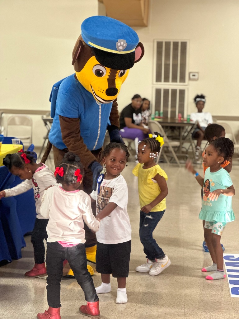 Paw Patrol Chase mascot with kids at birthday party Birmingham