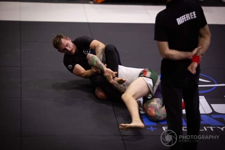 Coach Alex competing at a Brazilian Jiu Jitsu tournament