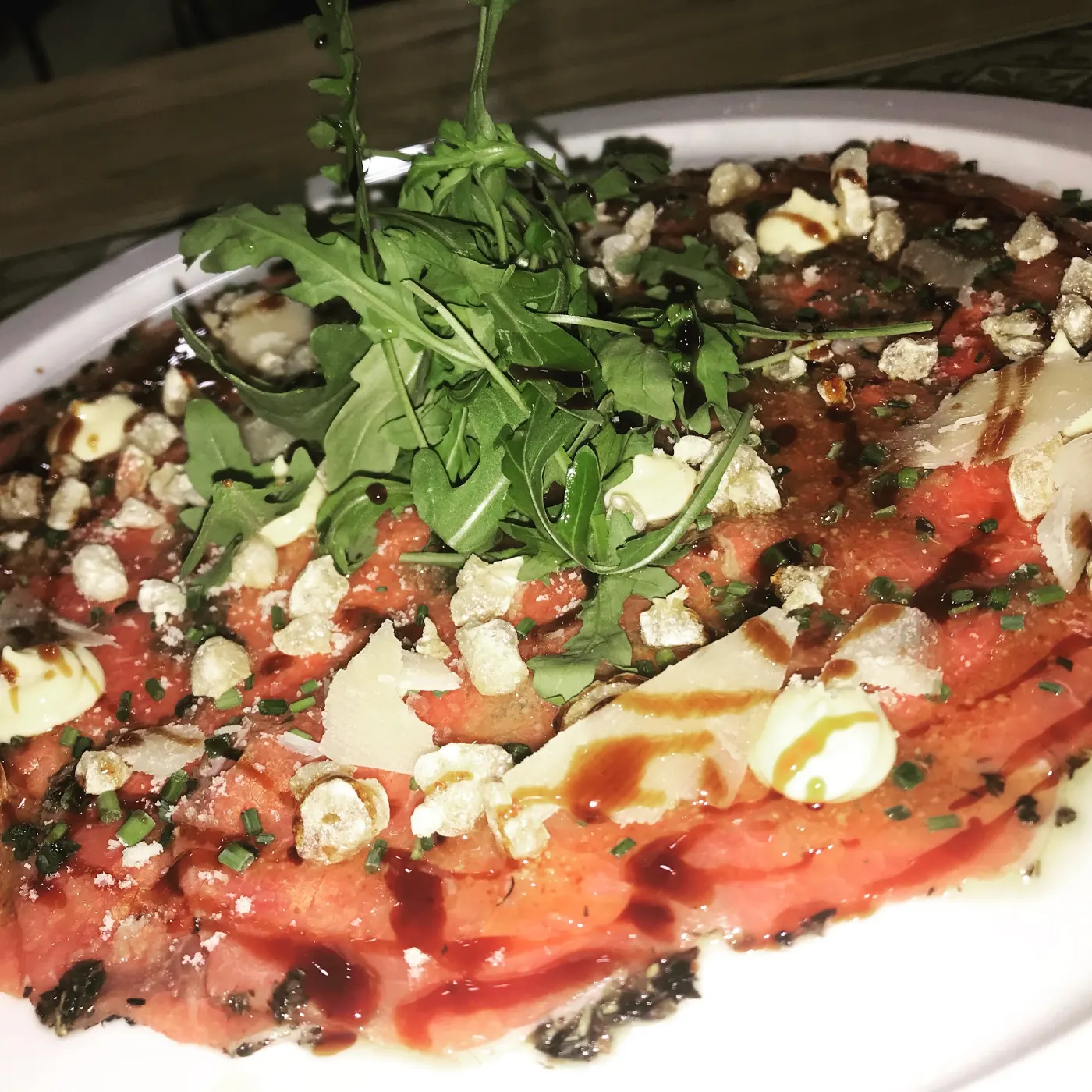 Pizza d'autor amb ruca i parmesà de L'Antiga Sastreria