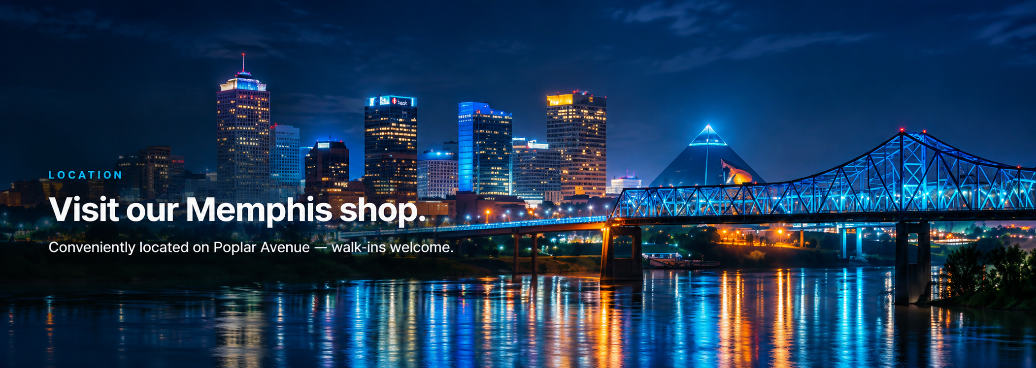 Memphis skyline and the illuminated Hernando de Soto bridge over the Mississippi River, the home of STS Repair