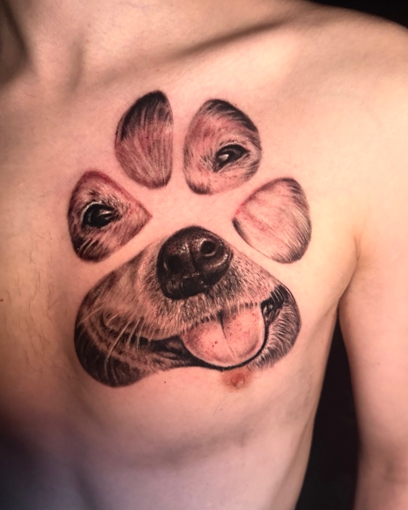 Dog paw realism chest tattoo by V01 Ink
