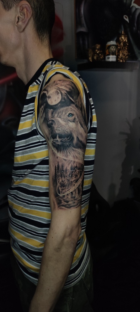 Wolf pack black and grey sleeve tattoo by V01 Ink