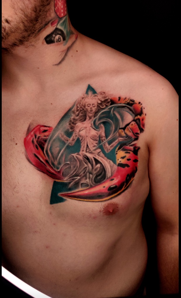 Colour goddess chest tattoo by V01 Ink