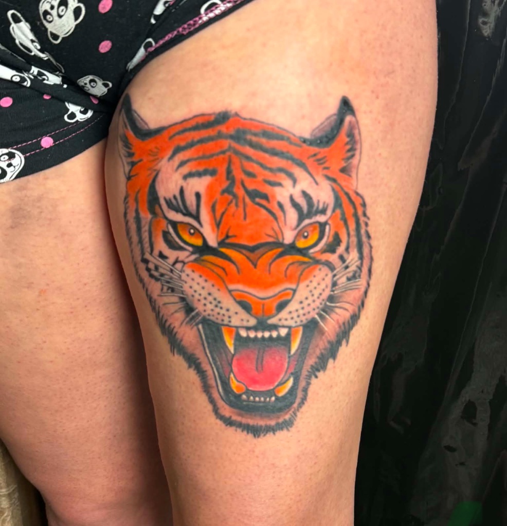 Tiger colour thigh tattoo by V01 Ink