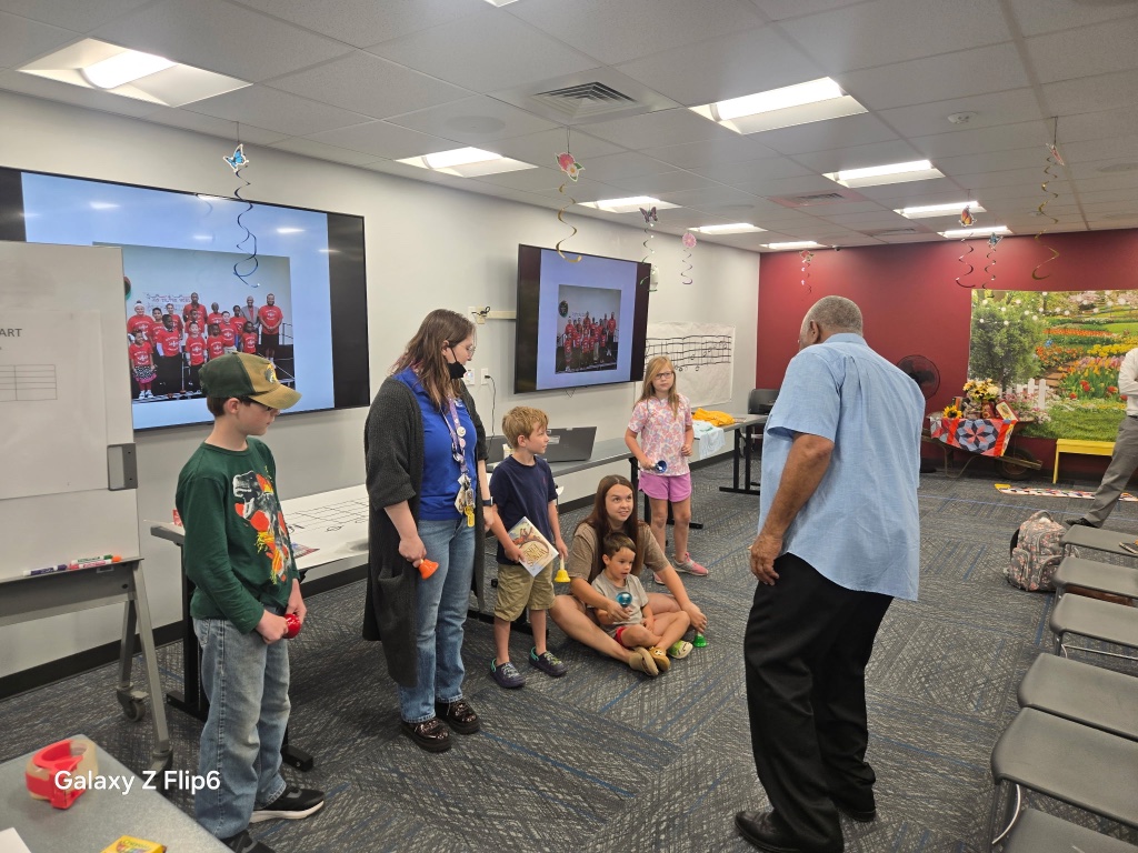 Students playing hand bells during a music activity
