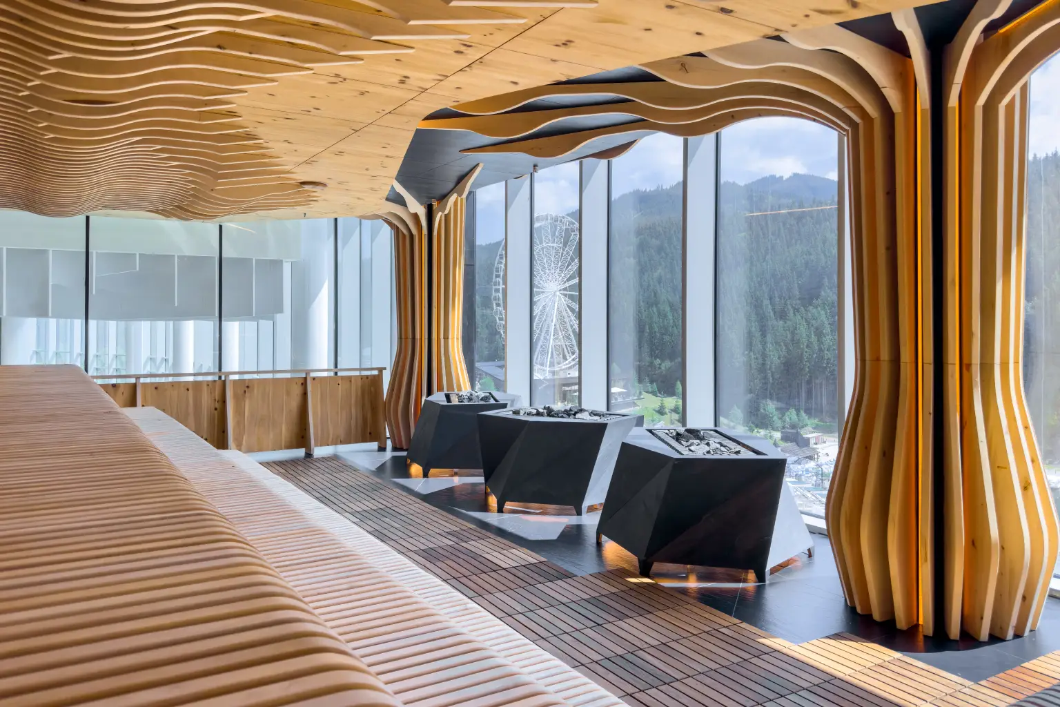 Modern office interior with warm wood slat ceiling, fluted acoustic panels, and integrated heaters