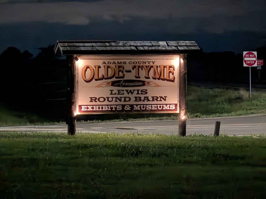Lewis Round Barn Sign at Night