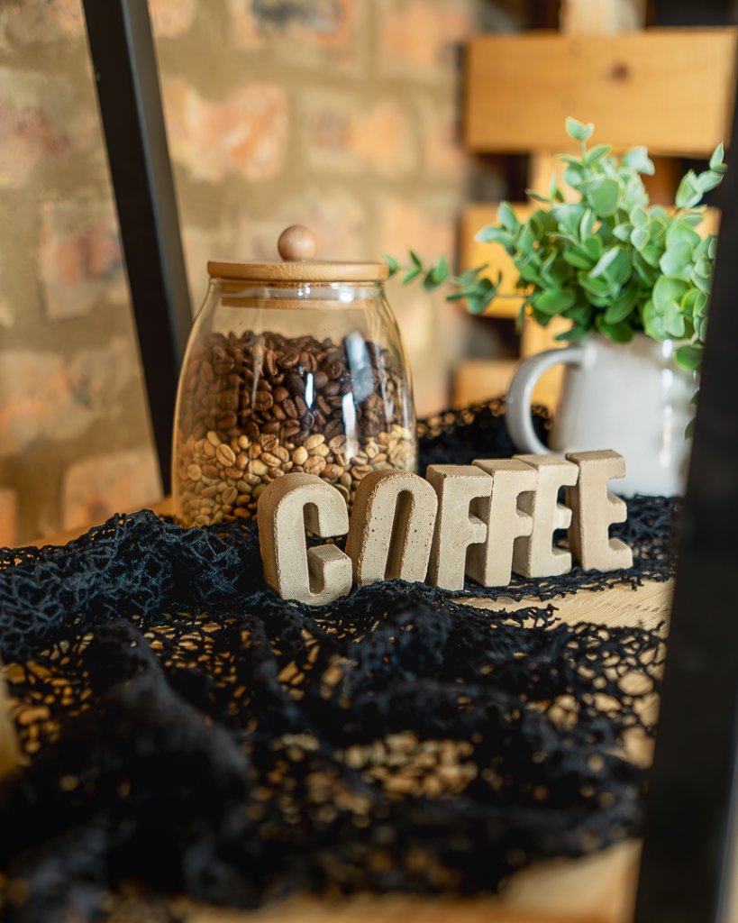COFFEE letters with bean canister