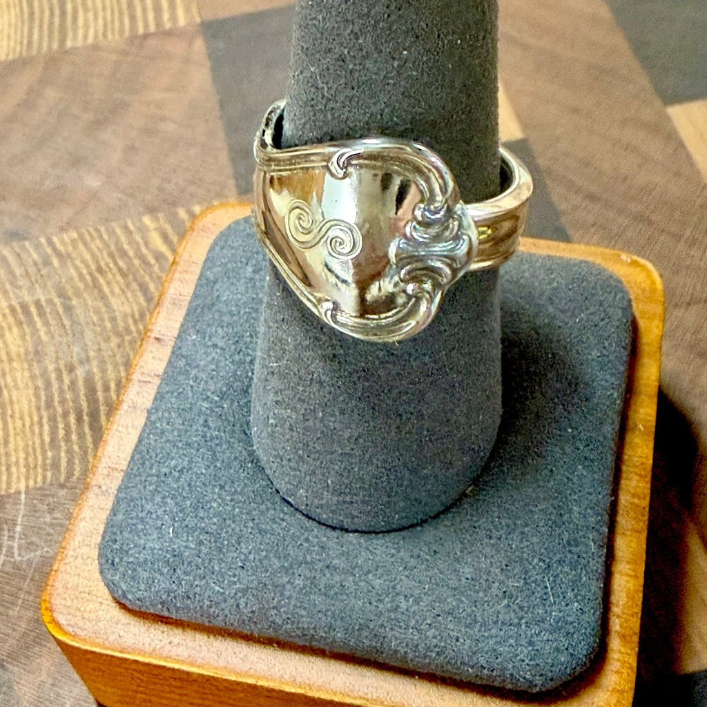 Custom ring crafted from antique silverware