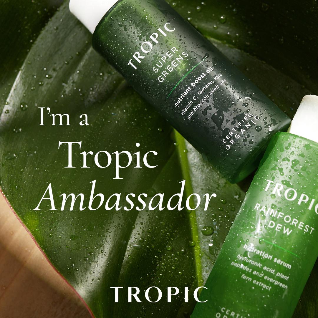 Tropic Super Greens nutrient boost oil and Rainforest Dew hydration serum on a monstera leaf, Lucy is a Tropic Ambassador