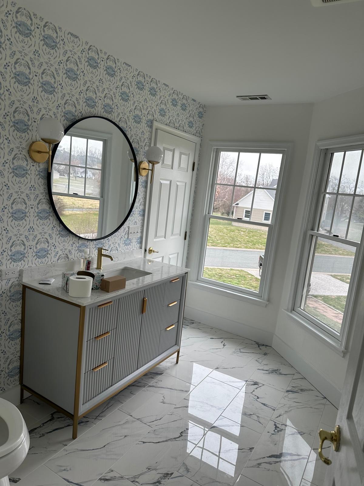 Blue crab pattern wallpaper accent wall in a bathroom