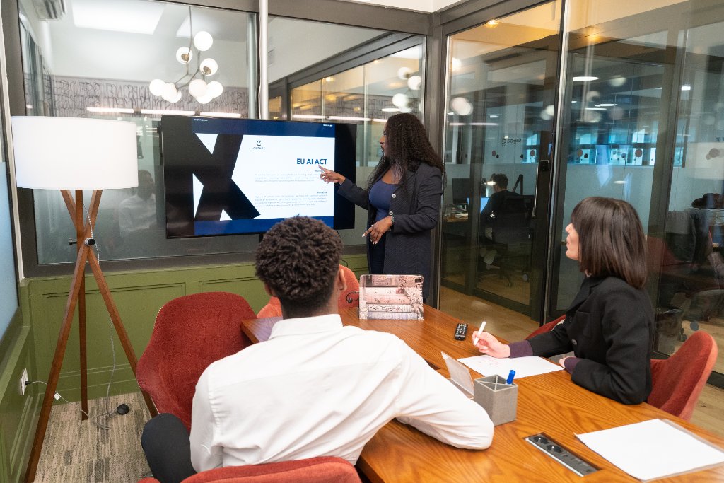 Hycentina delivering AI governance literacy training