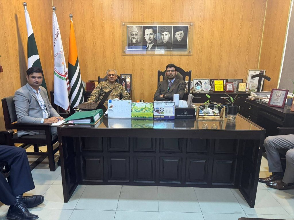 Principal's office meeting with dignitaries