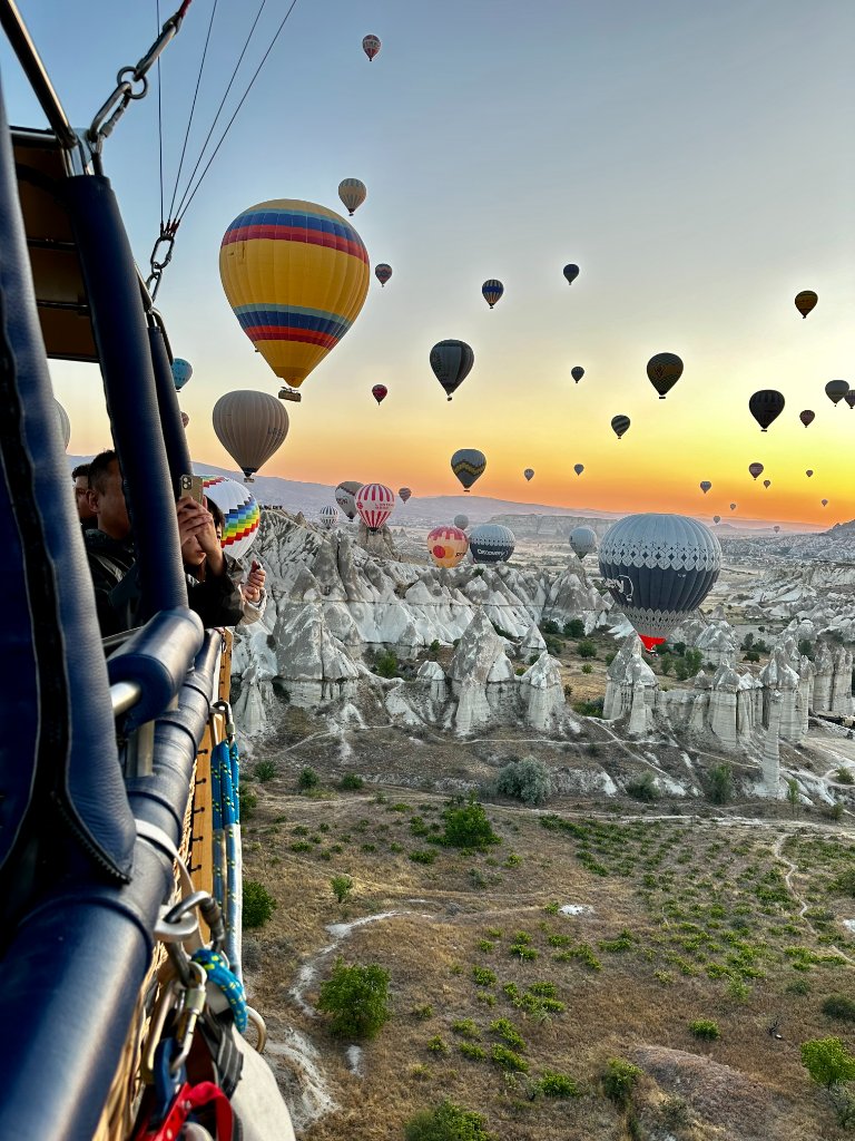 View from inside the balloon basket over Cappadocia at sunrise