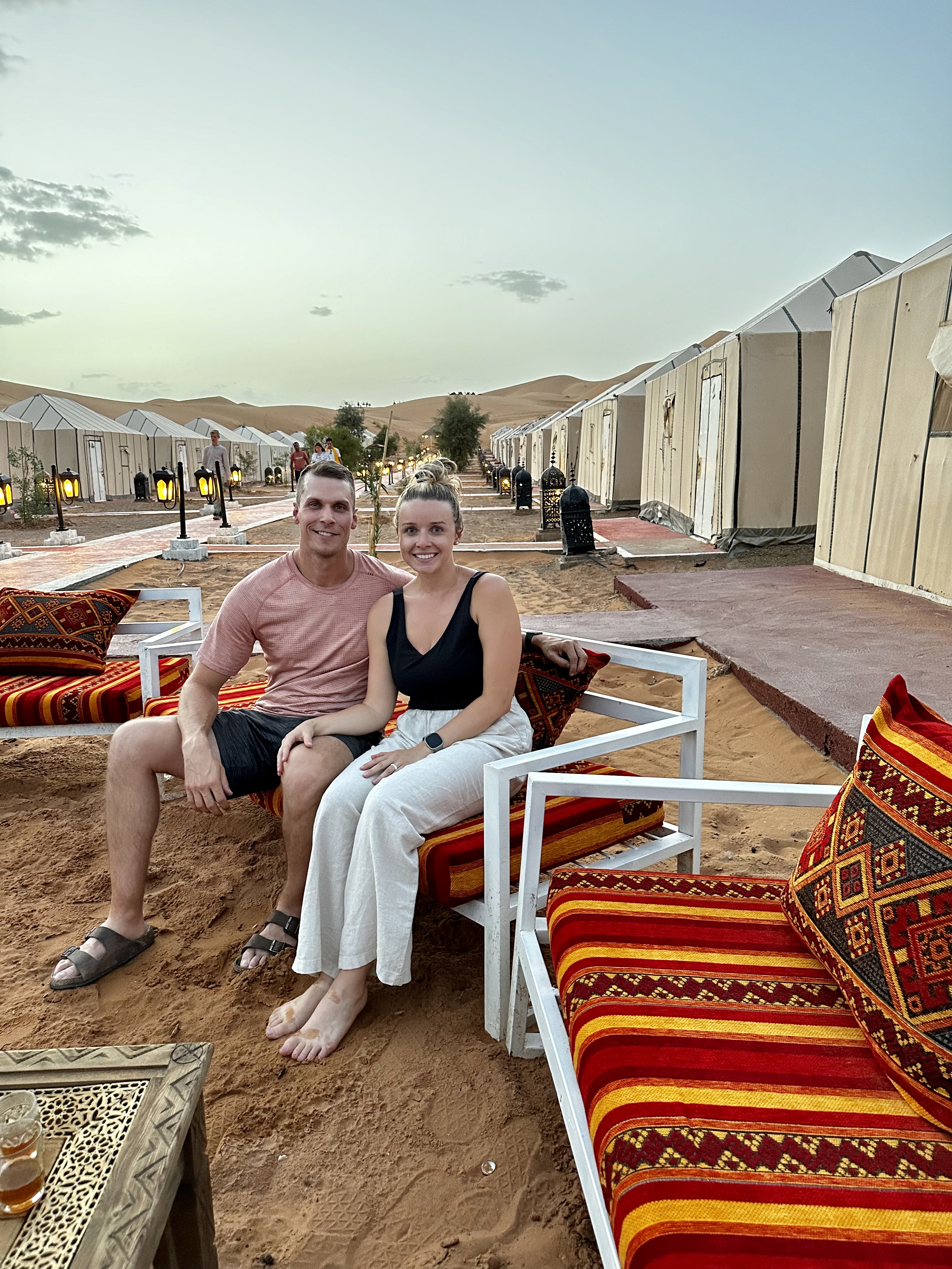 Relaxing at the desert camp at dusk in the Sahara