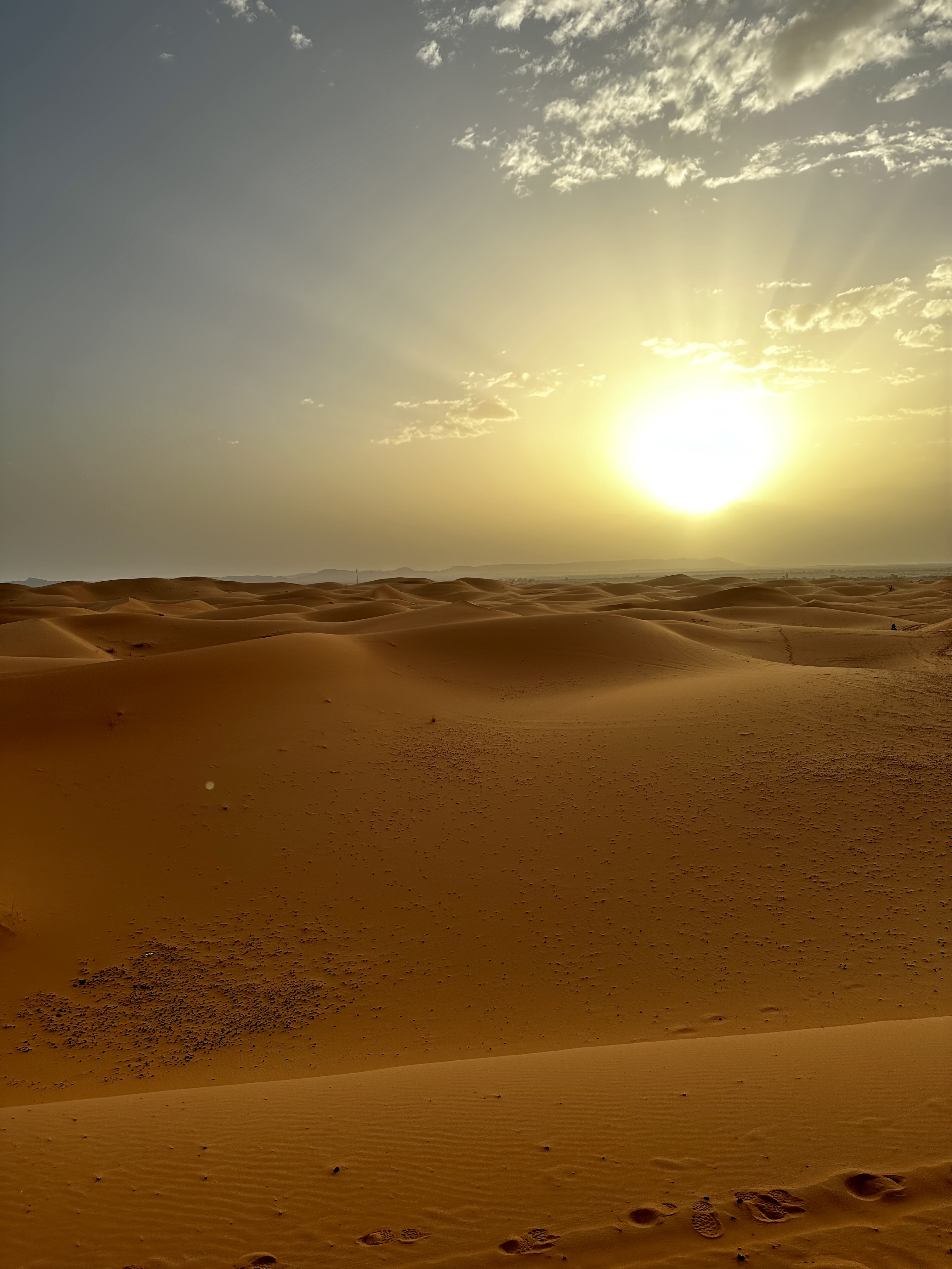 Sunset over the rolling sand dunes of Erg Chebbi