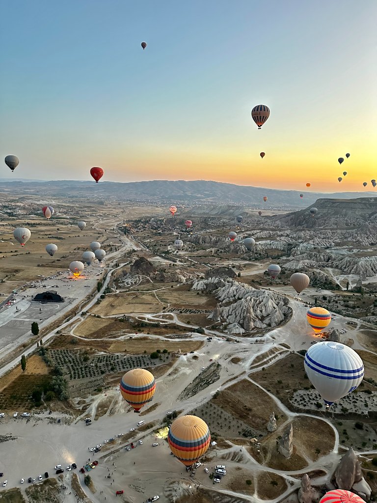 Hot air balloons at sunrise over Cappadocia
