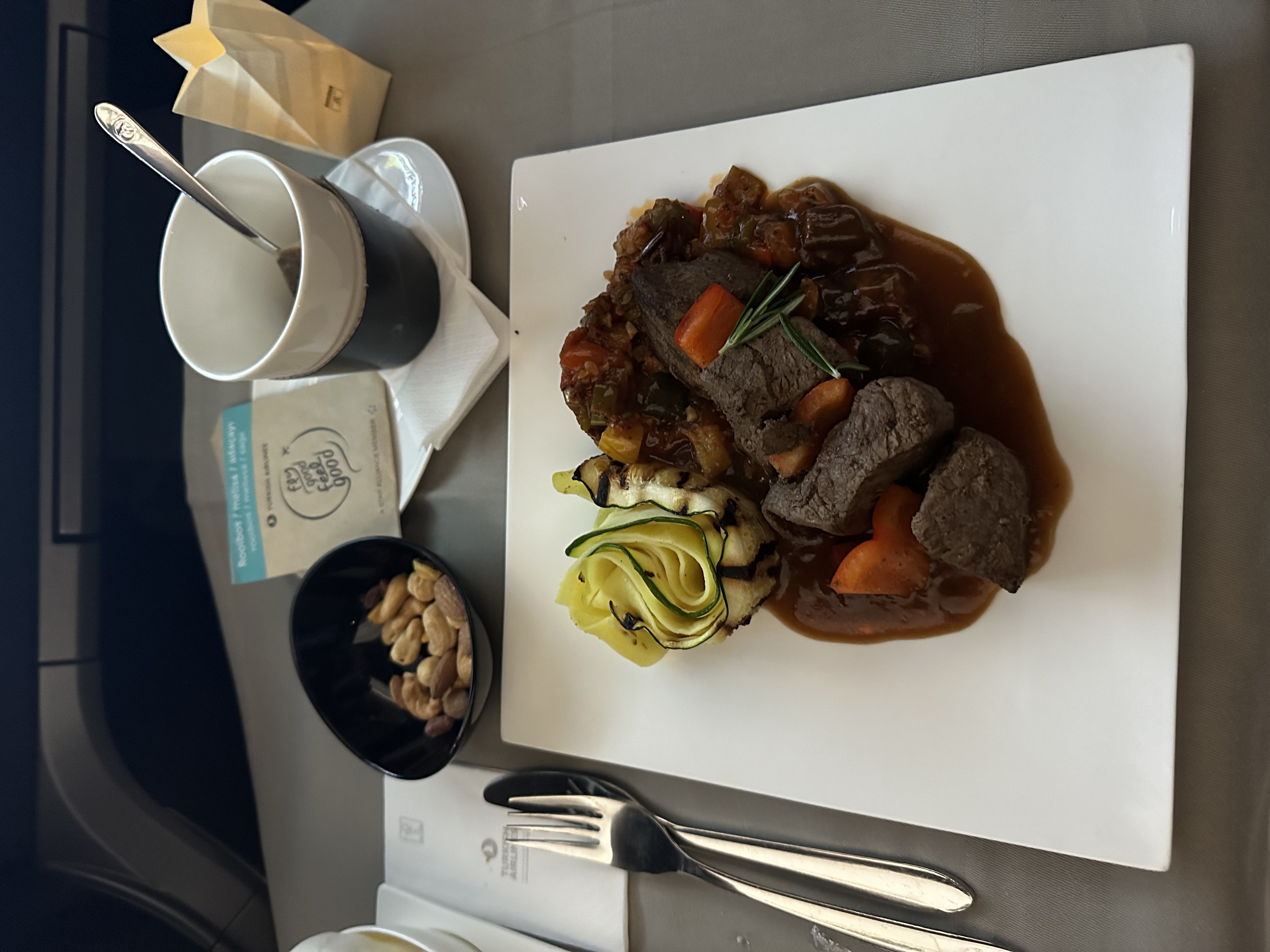 Beef brochette with zucchini and herb jus served on Turkish Airlines business class
