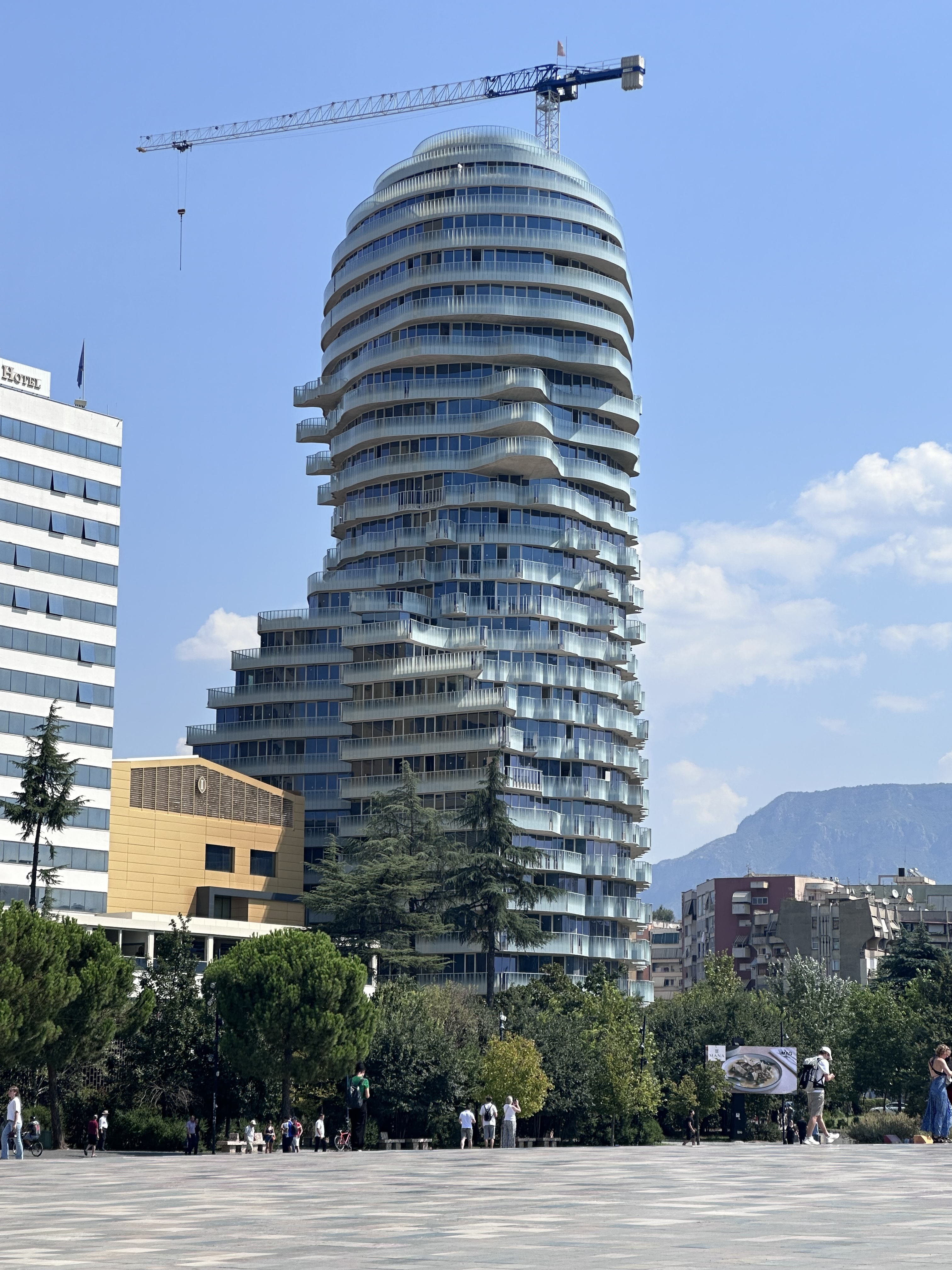 Modern high-rise building under construction in Tirana