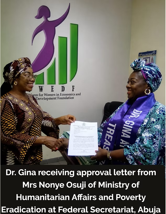 Dr. Gina receiving approval letter from Ministry of Humanitarian Affairs