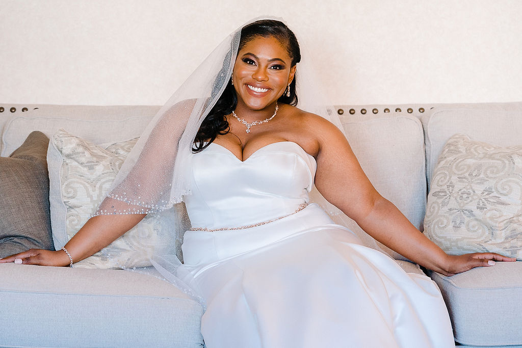 Bridal party laughing together