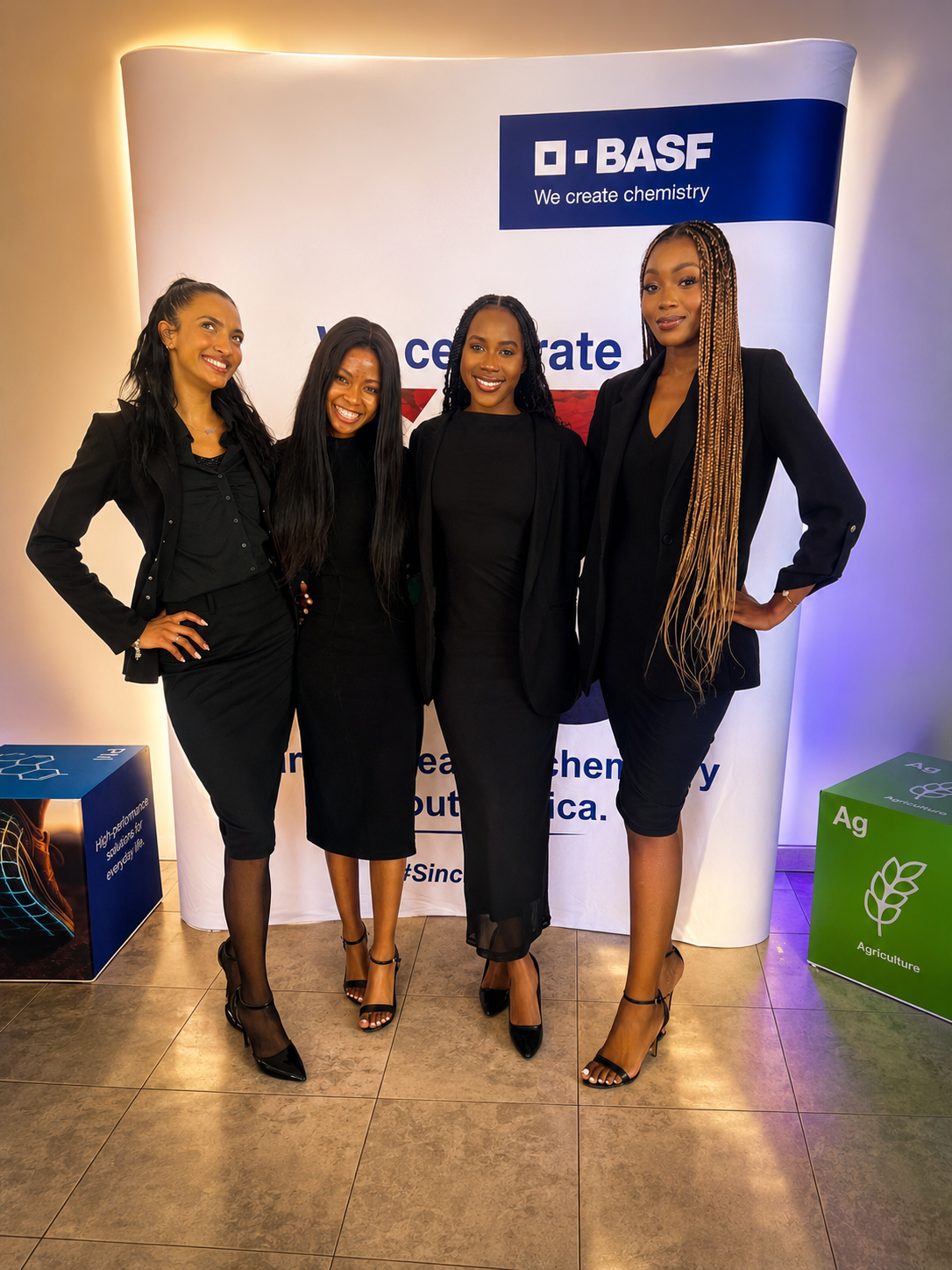 MRJ Promotions registration ladies in elegant black attire at the BASF 60th anniversary celebration