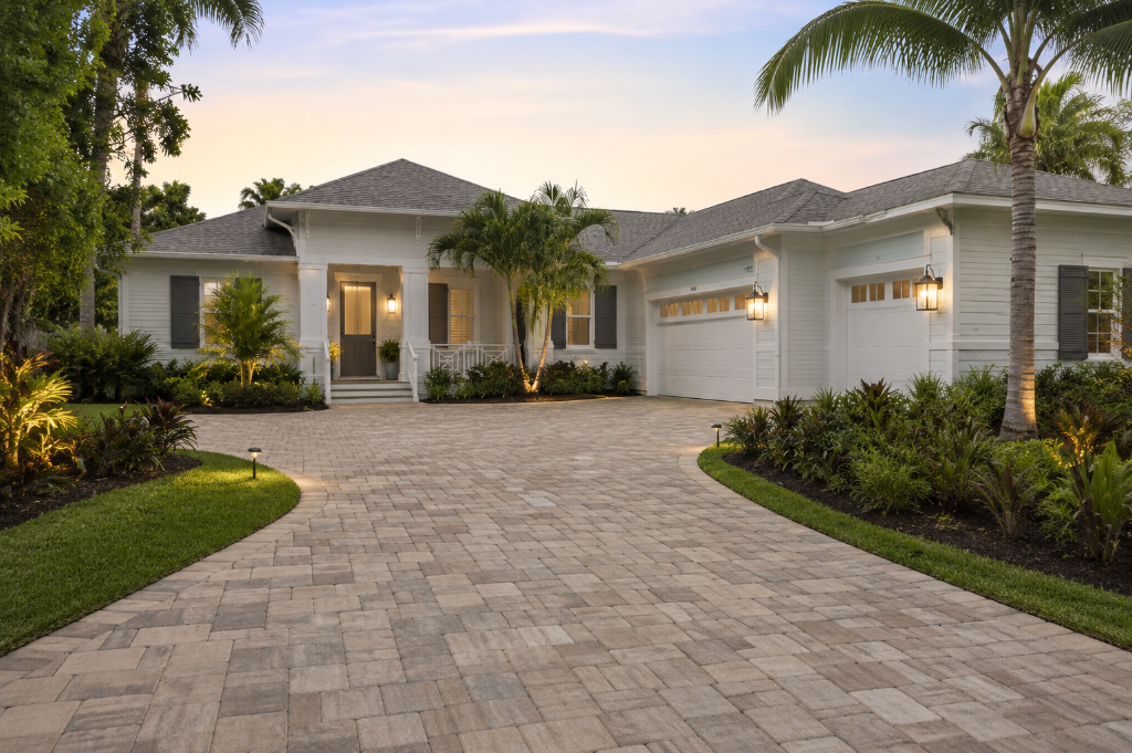 Pressure washing transformation showing clean restored driveway and exterior surfaces
