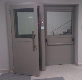 Glass-insert steel security door pair