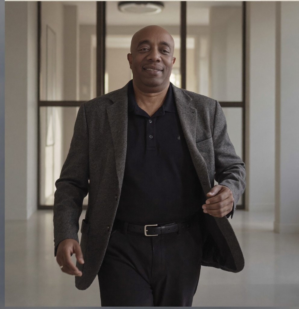 A confident professional walking forward, representing a successful career change after 45