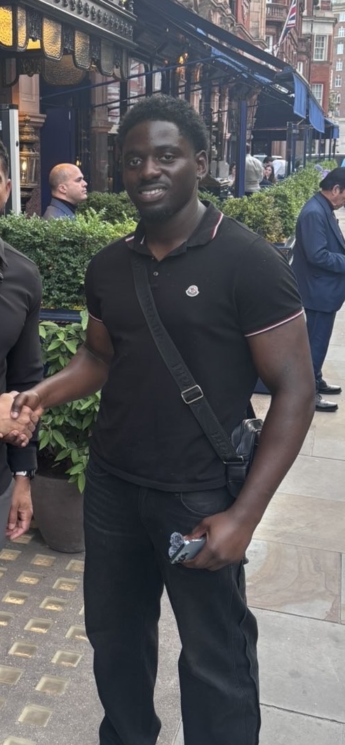One of the Inside Excellence founders greeting a passer-by on a London street