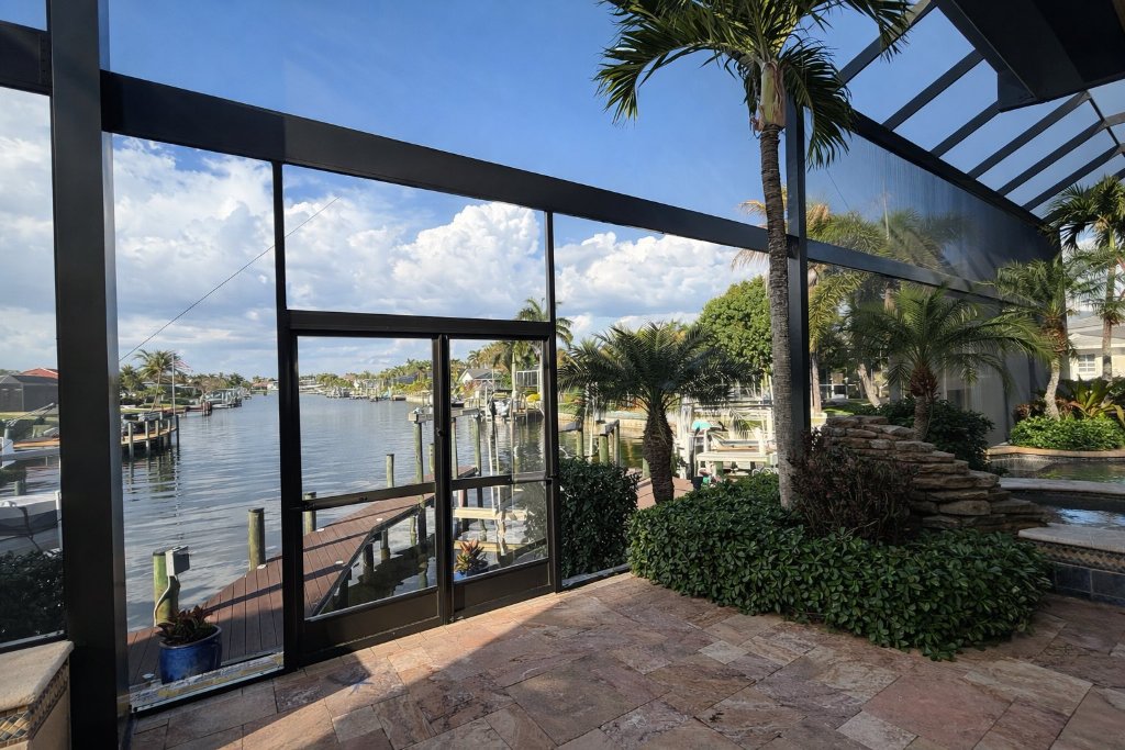 Screen Repair Quotes — Screen enclosure with lake view