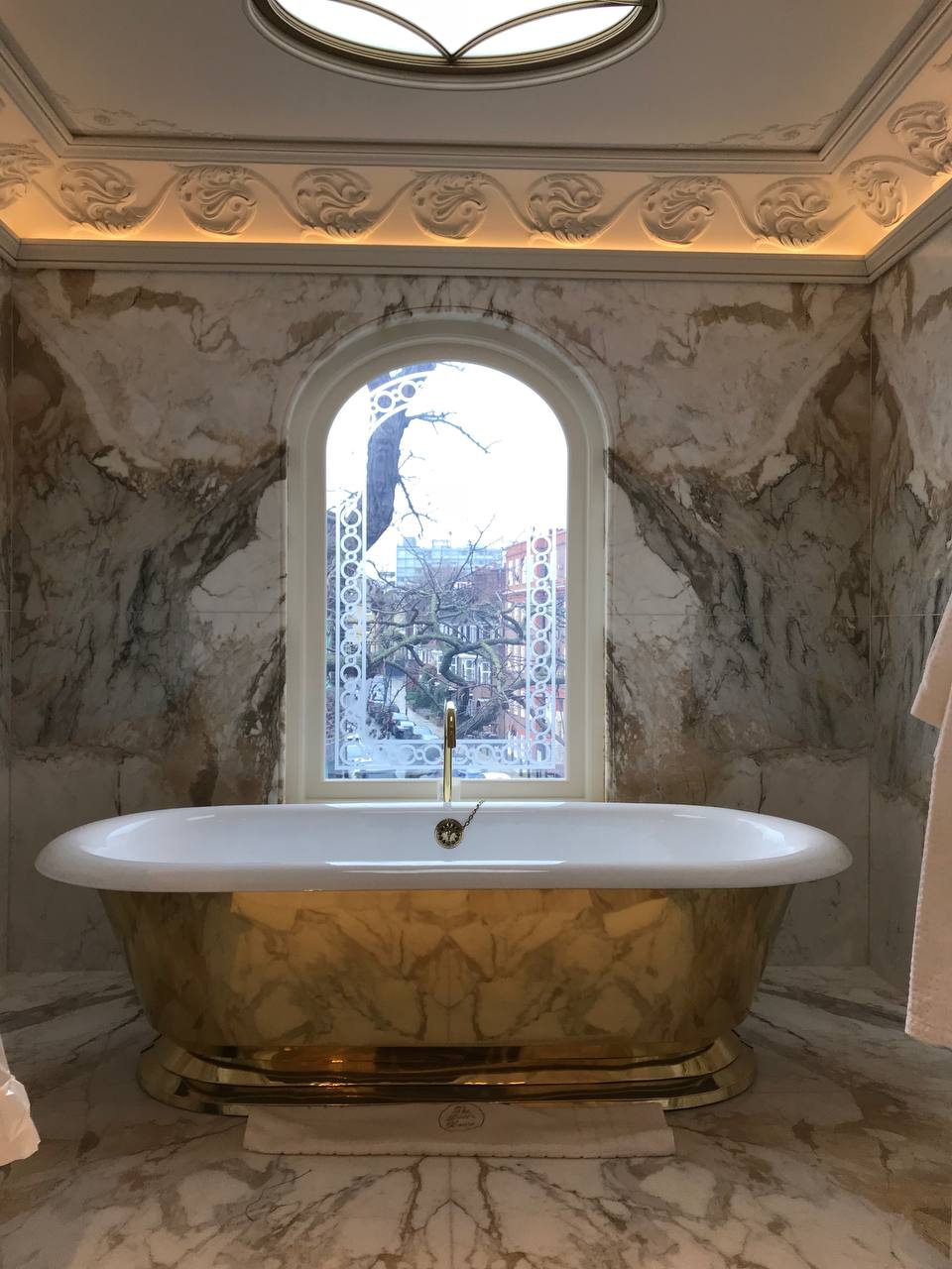 Gold freestanding bath — Calacatta marble floor to ceiling, Nazemi Construction 2017
