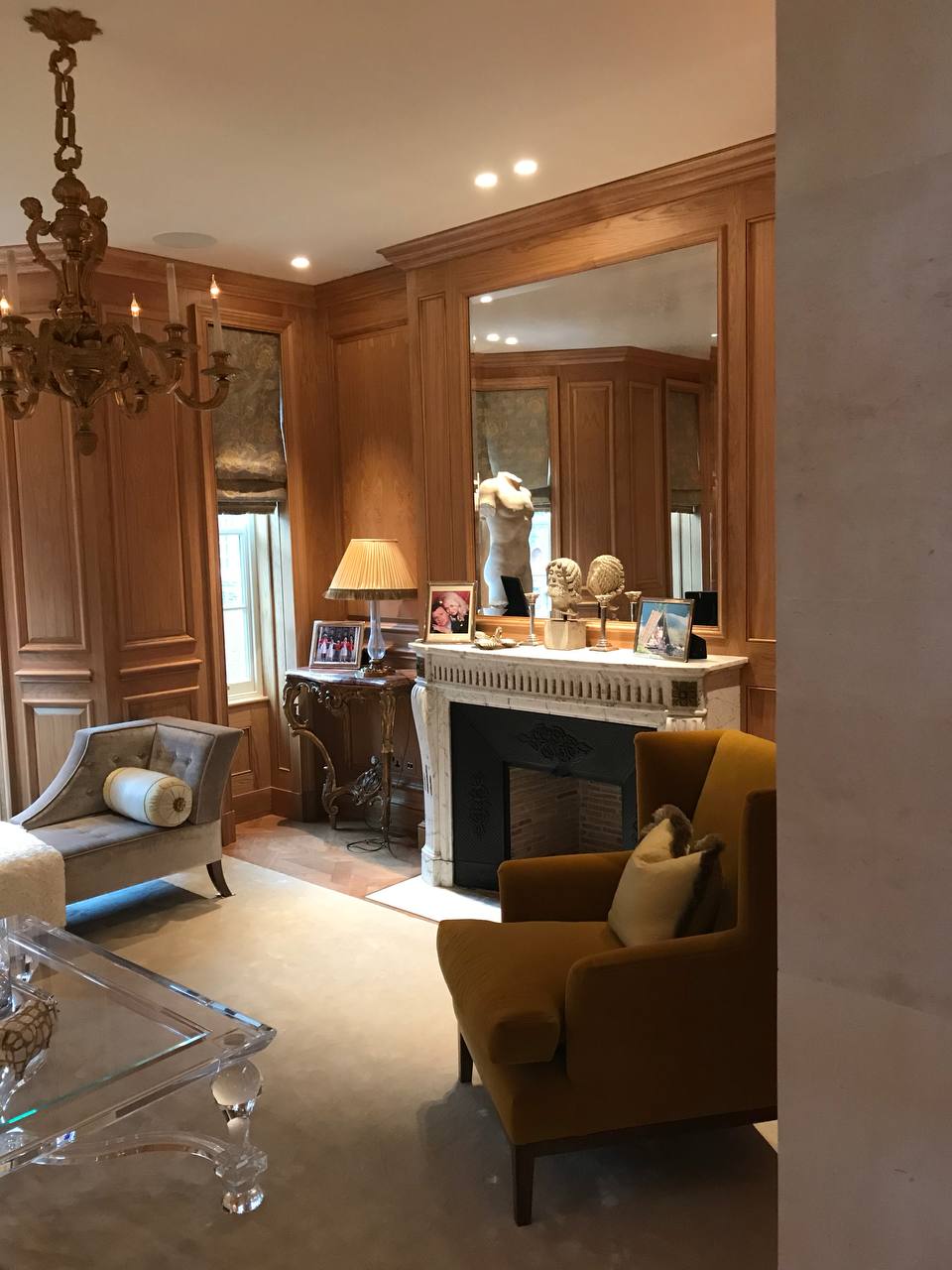 Reception room — full oak wall panelling, marble fireplace surround