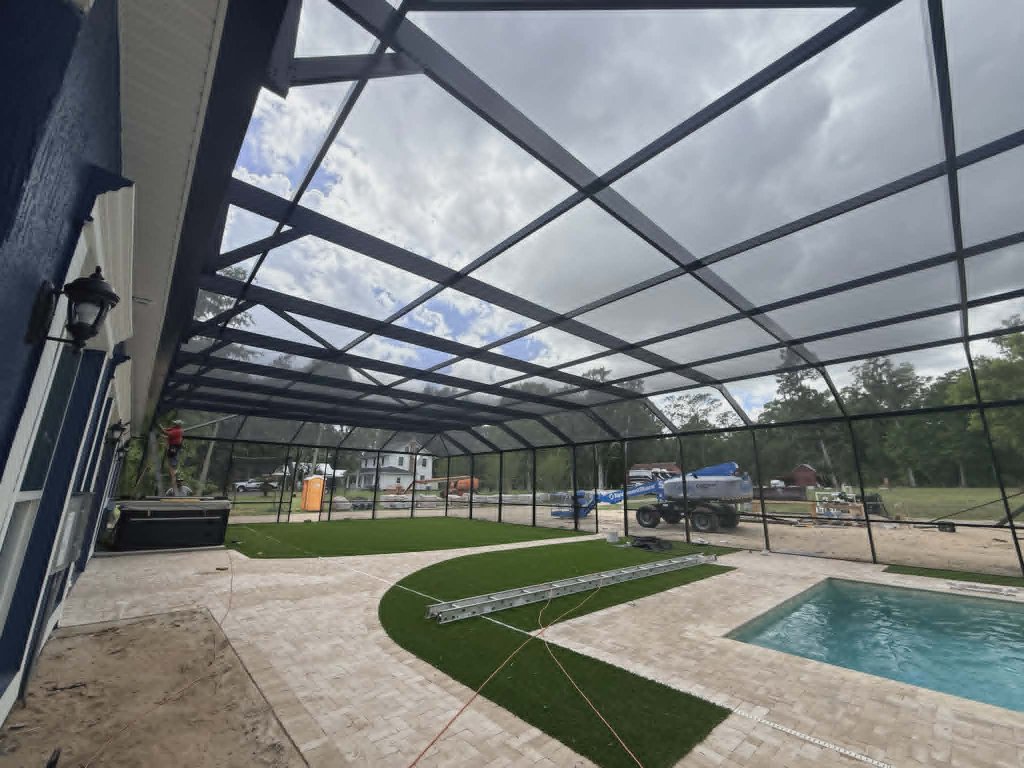 Backyard pool enclosure installation in Lake Helen