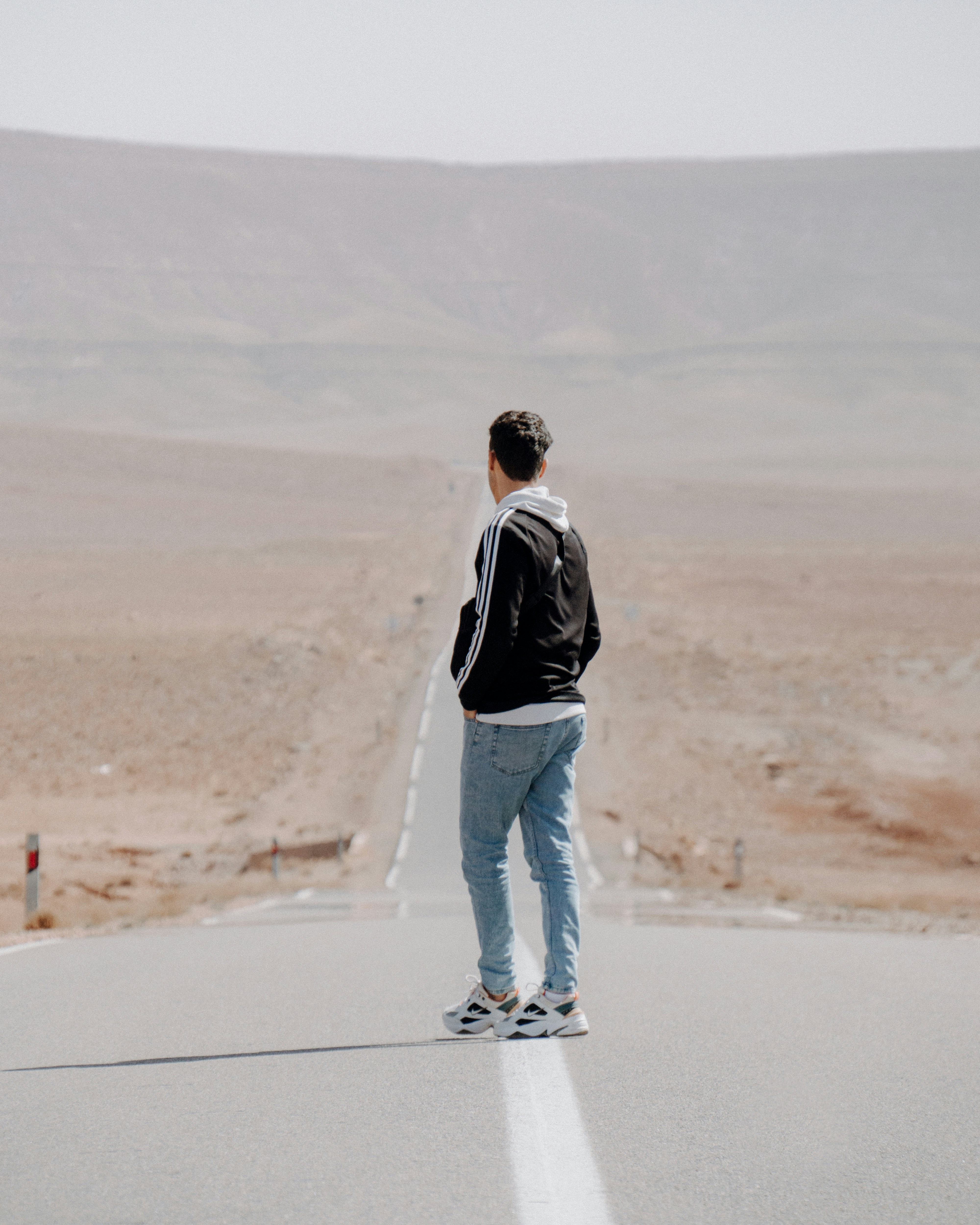 Person standing at a viewpoint with clarity and direction