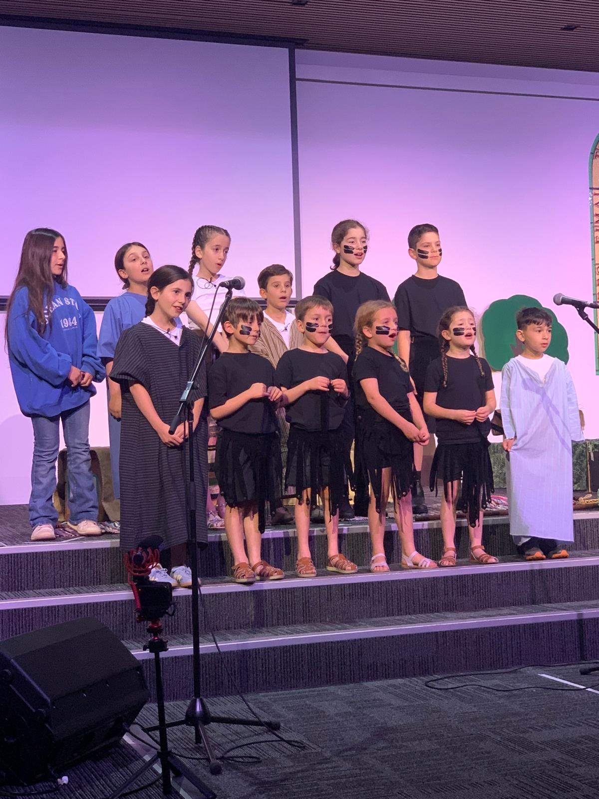Children singing in the annual production