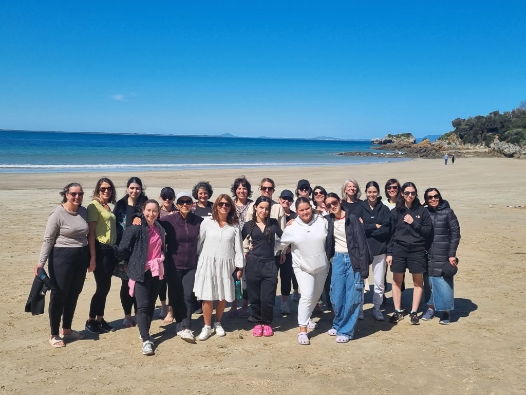 Women on the beach at the annual retreat
