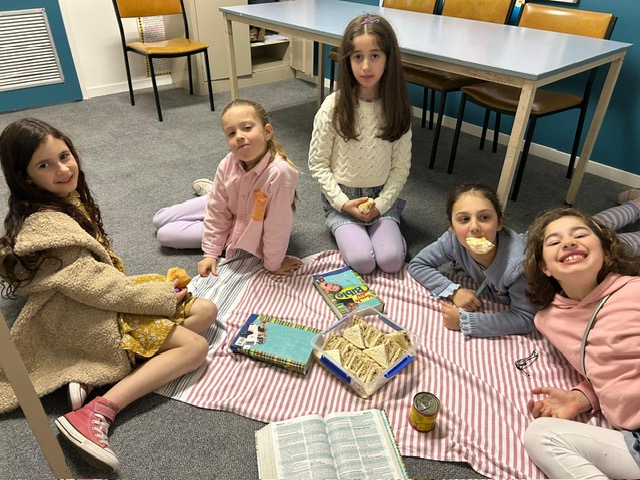Children enjoying a picnic during Sunday School