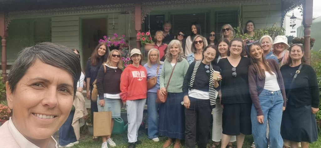 Women at a cottage gathering