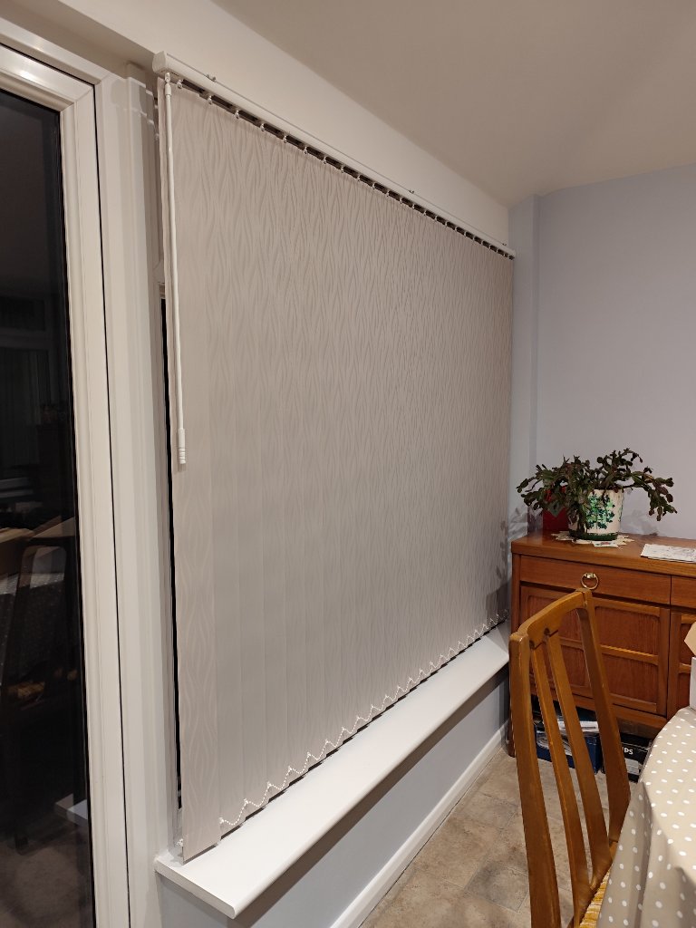Conservatory blind fitted beside patio door