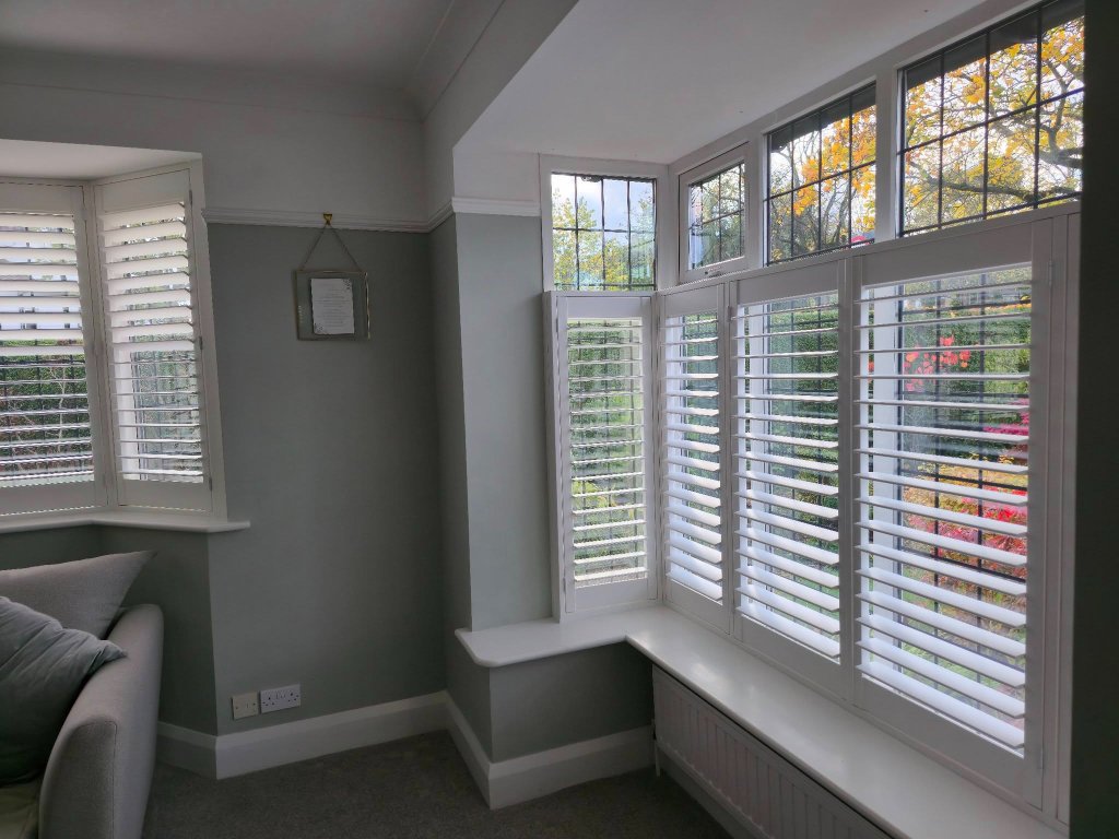 Plantation shutters on multiple windows in a Yorkshire home