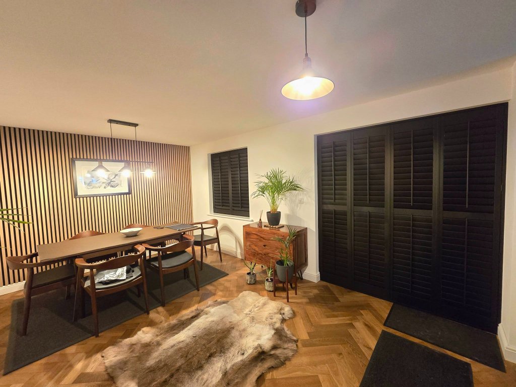 Dark plantation shutters in a stylish Yorkshire dining room