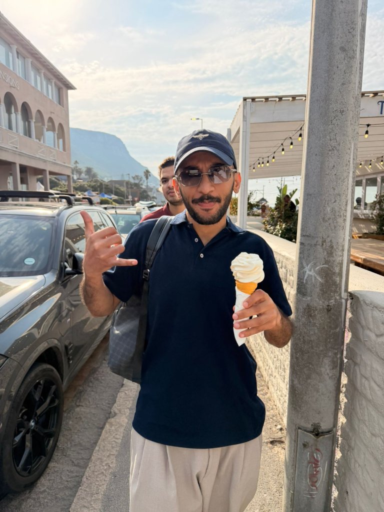 Guest with ice cream in a coastal town