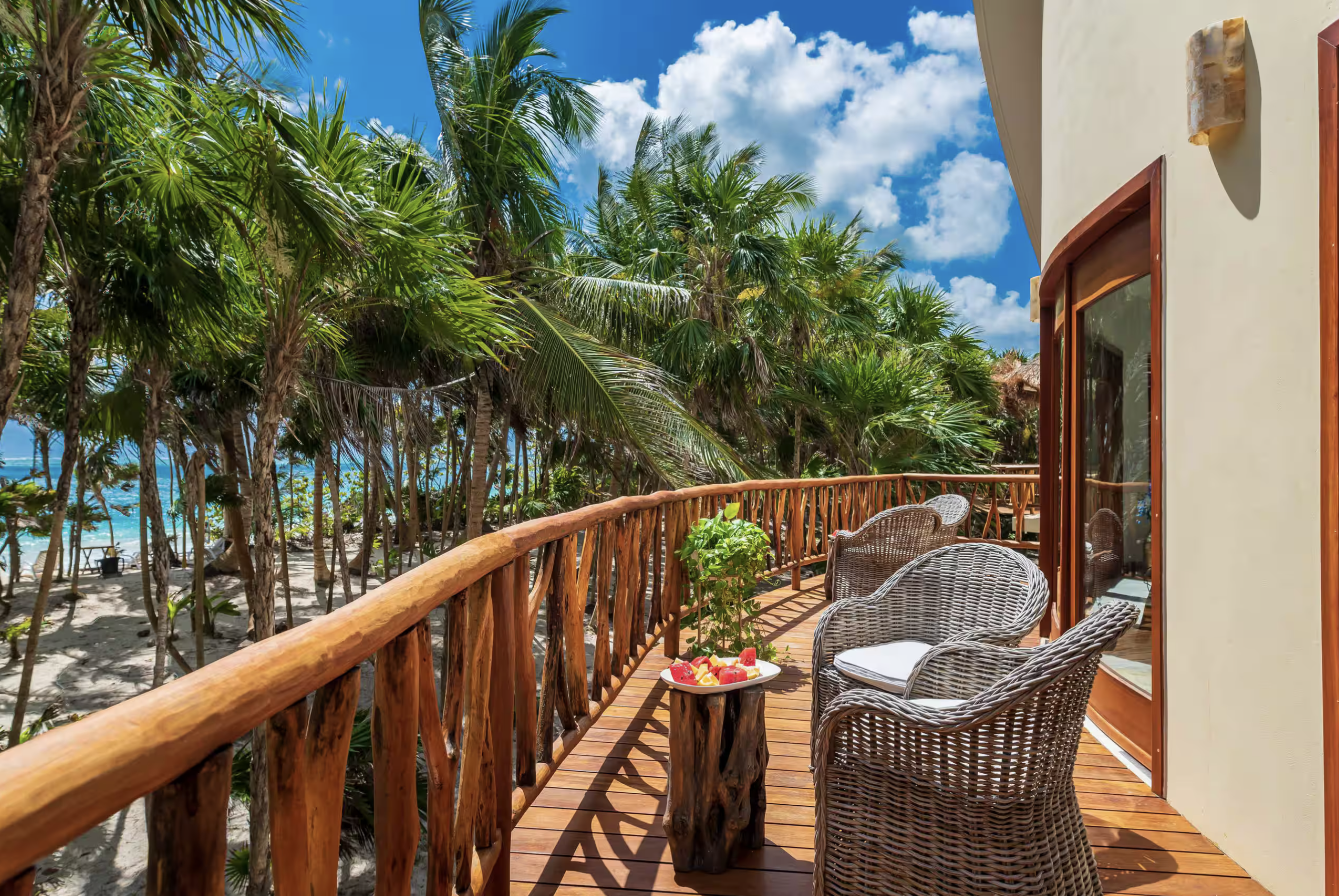 Balcony lounge with stucco wall & sea